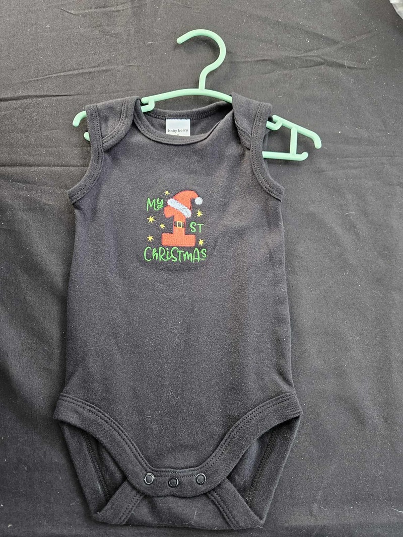 1st Christmas Onesie $20 Sizes 000-2 Short Sleeves or singlet.  White, Black, Tan, Blue or Pink